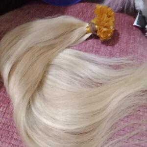 New U tipped Remy hair 135-140 strands.